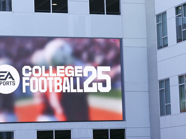 ORLANDO, FLORIDA - JANUARY 31: A video billboard adverting for EA Sports College Football 25 on the outside of an office building on January 31, 2025 in Orlando, Florida.