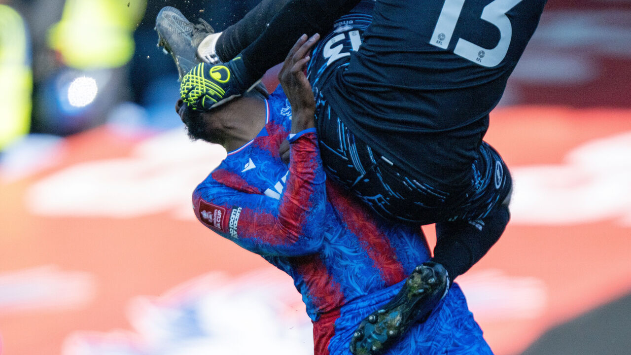 LONDON, ENGLAND - MARCH 1: Jean-Philippe Mateta of Crystal Palace injured by a kick in the face by Millwall goalkeeper during the Emirates FA Cup Fifth Round match between Crystal Palace and Millwall at Selhurst Park on March 1, 2025 in London, England.