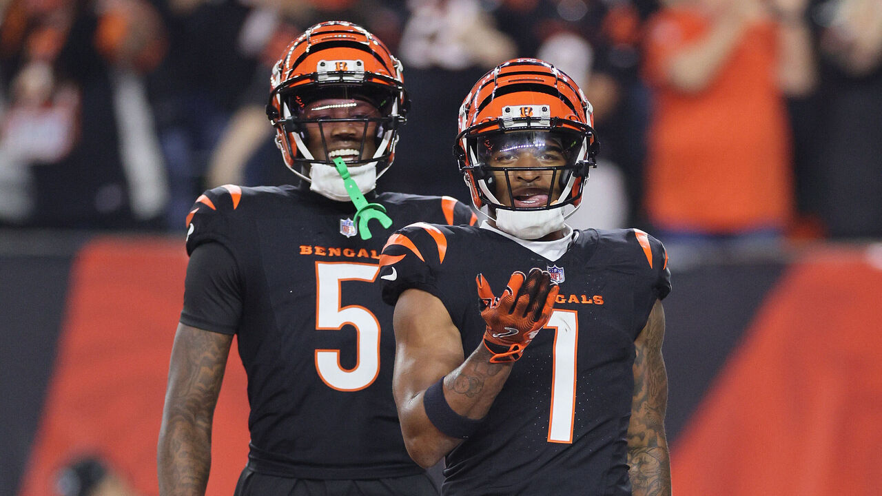 CINCINNATI, OHIO - SEPTEMBER 23: Ja'Marr Chase #1and Tee Higgins #5 of the Cincinnati Bengals celebrate after Chase scored a touchdown against the Washington Commanders at Paycor Stadium on September 23, 2024 in Cincinnati, Ohio.