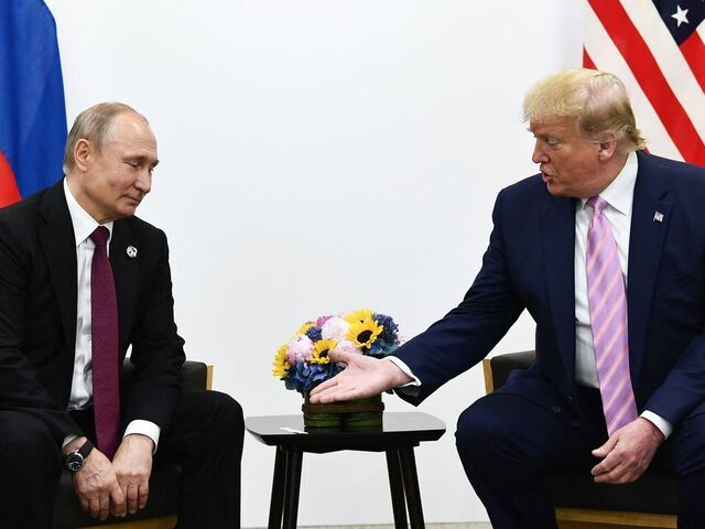 US President Donald Trump (R) attends a meeting with Russia's President Vladimir Putin during the G20 summit in Osaka on June 28, 2019.