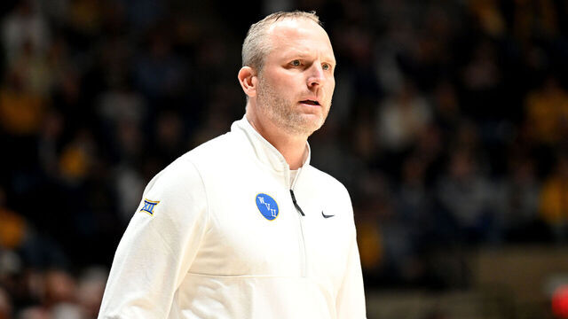 MORGANTOWN, WEST VIRGINIA - JANUARY 18: Head coach Darian DeVries of the West Virginia Mountaineers watches the game against the Iowa State Cyclones at WVU Coliseum on January 18, 2025 in Morgantown, West Virginia.