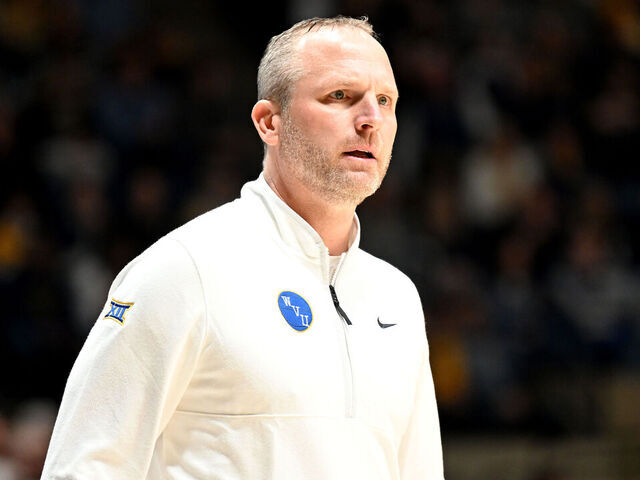 MORGANTOWN, WEST VIRGINIA - JANUARY 18: Head coach Darian DeVries of the West Virginia Mountaineers watches the game against the Iowa State Cyclones at WVU Coliseum on January 18, 2025 in Morgantown, West Virginia.