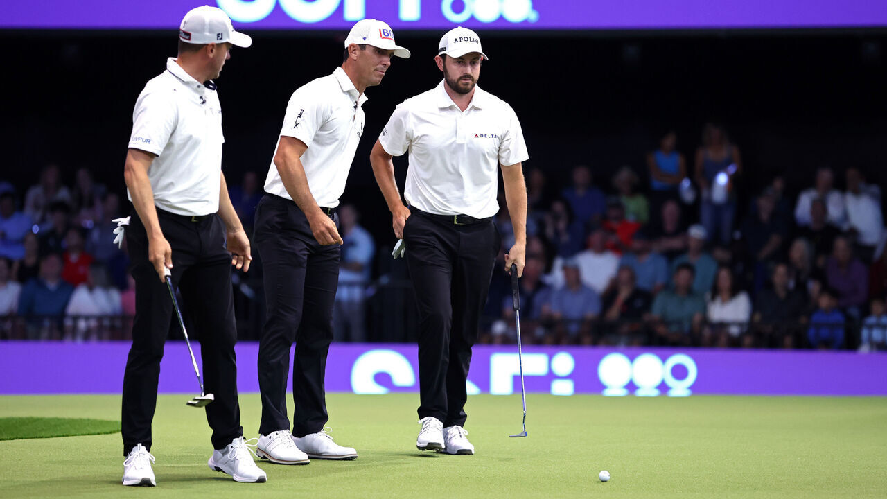 PALM BEACH GARDENS, FLORIDA - MARCH 18: Justin Thomas, Billy Horschel and Patrick Cantlay of Atlanta Drive GC lines up a putt on the first green during their TGL presented by SoFi match against The Bay Golf Club at SoFi Center on March 18, 2025 in Palm Beach Gardens, Florida.