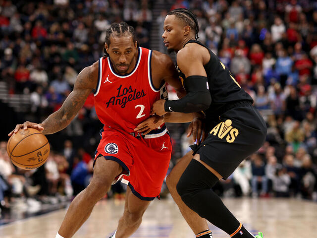 INGLEWOOD, CALIFORNIA - MARCH 18: Kawhi Leonard #2 of the Los Angeles Clippers drives to the basket against Isaac Okoro #35 of the Cleveland Cavaliers during the fourth quarter at Intuit Dome on March 18, 2025 in Inglewood, California.