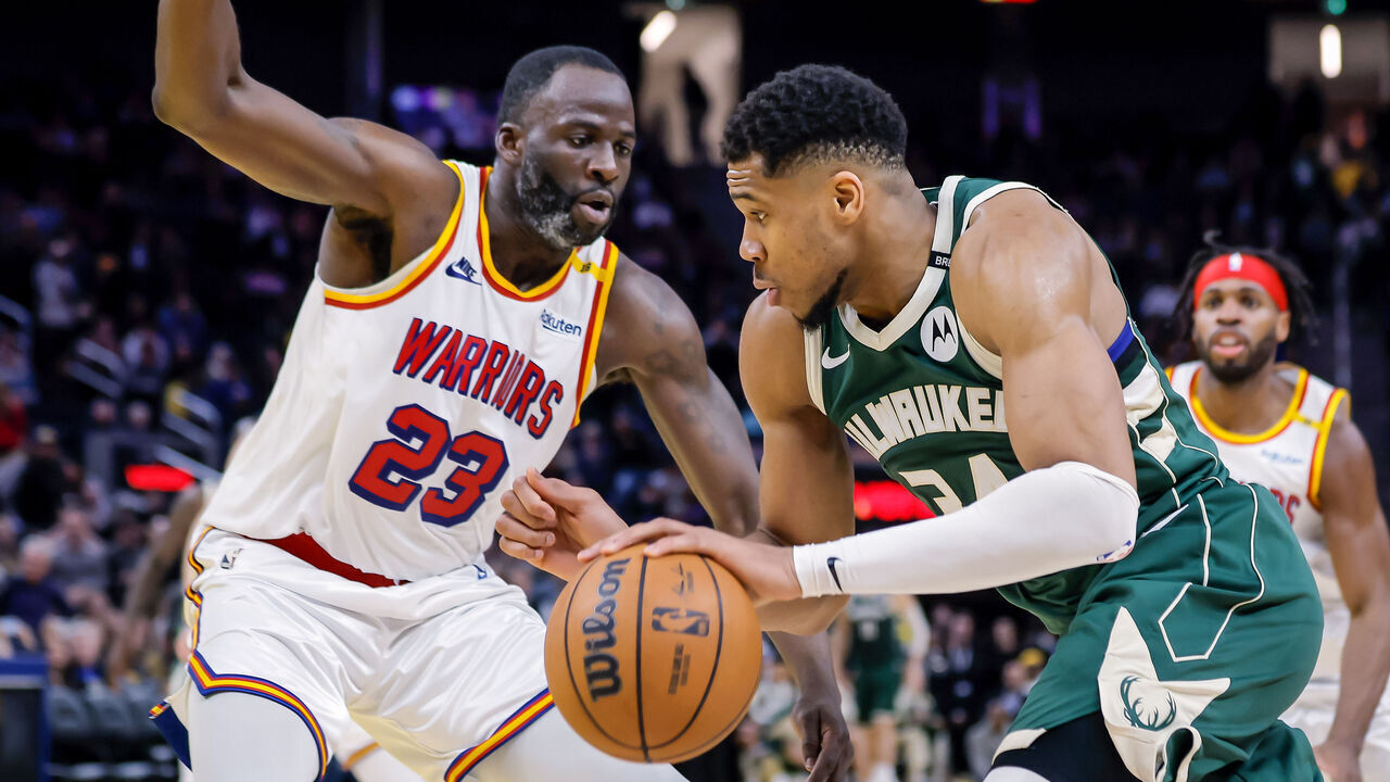 Draymond Green (23) defends against Giannis Antetokounmpo (34) in the second half as the Golden State Warriors played the Milwaukee Bucks at Chase Center in San Francisco, on Tuesday, March 18, 2025.