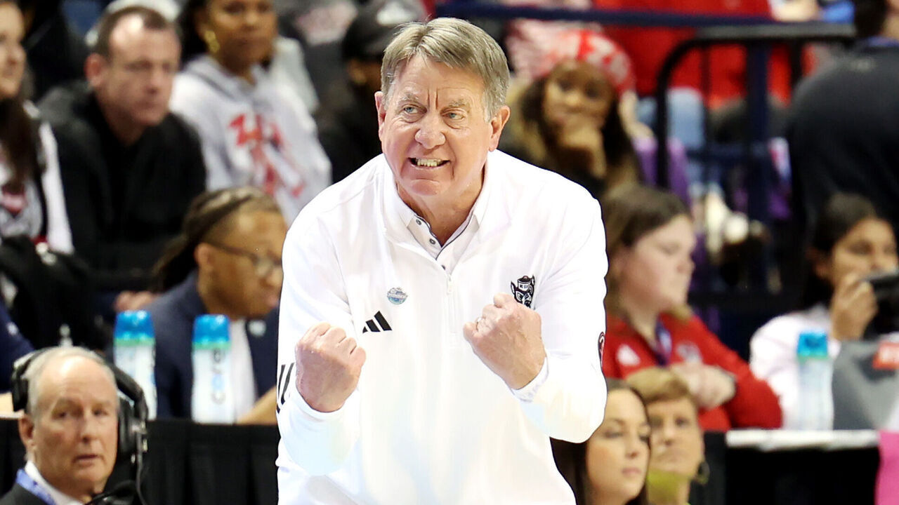 GREENSBORO, NORTH CAROLINA - MARCH 09: Head coach Wes Moore of the NC State Wolfpack yells out a play to team during the ACC Women's Basketball Tournament Championship Game against the Duke Blue Devils at Greensboro Coliseum Complex on March 09, 2025 in Greensboro, North Carolina.