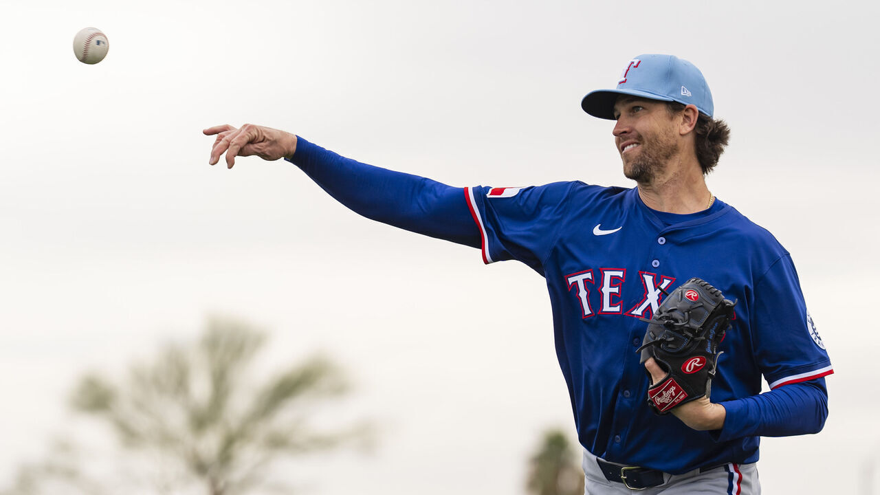 SURPRISE, AZ - FEBRUARY 12: Jacob deGrom #48 of the Texas Rangers throws during a spring training workout at Surprise Stadium on February 12, 2025 in Surprise, Arizona.