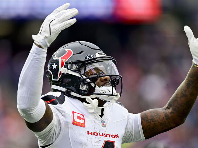FOXBOROUGH, MASSACHUSETTS - OCTOBER 13: Stefon Diggs #1 of the Houston Texans celebrates after scoring a touchdown against the New England Patriots during the third quarter of the game at Gillette Stadium on October 13, 2024 in Foxborough, Massachusetts.