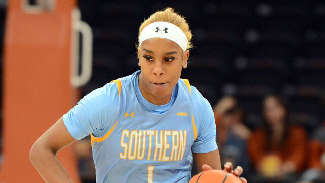 AUSTIN, TX - DECEMBER 11: Southern University Jaguars guard Aniya Gourdine (1) is chased by Texas Longhorns guard Rori Harmon during game featuring the Southern University Jaguars and Texas Longhorns on December 11, 2024, at the Moody Center in Austin, TX.