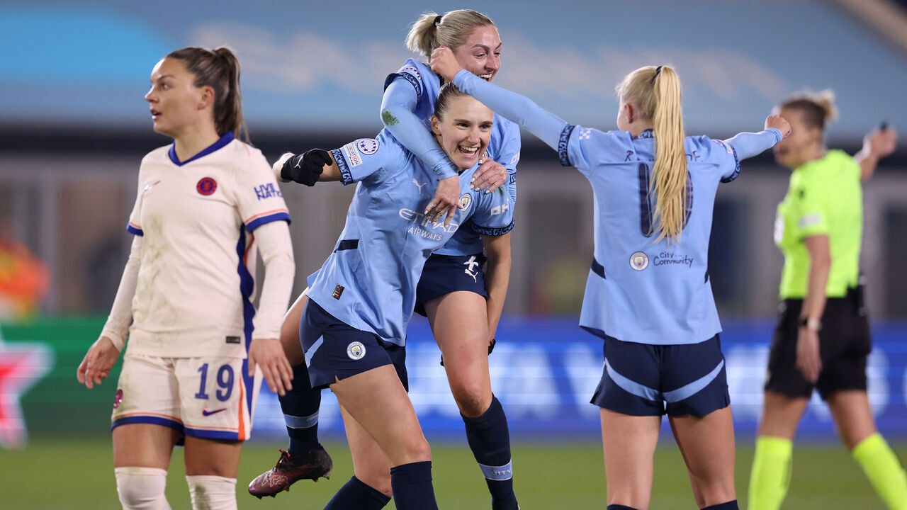 MANCHESTER, ENGLAND - MARCH 19: Vivianne Miedema of Manchester City celebrates with Laura Coombs after scoring their second goal during the UEFA Women's Champions League Quarter Finals First Leg match between Manchester City and Chelsea FC at Joie Stadium on March 19, 2025 in Manchester, England.