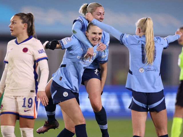 MANCHESTER, ENGLAND - MARCH 19: Vivianne Miedema of Manchester City celebrates with Laura Coombs after scoring their second goal during the UEFA Women's Champions League Quarter Finals First Leg match between Manchester City and Chelsea FC at Joie Stadium on March 19, 2025 in Manchester, England.
