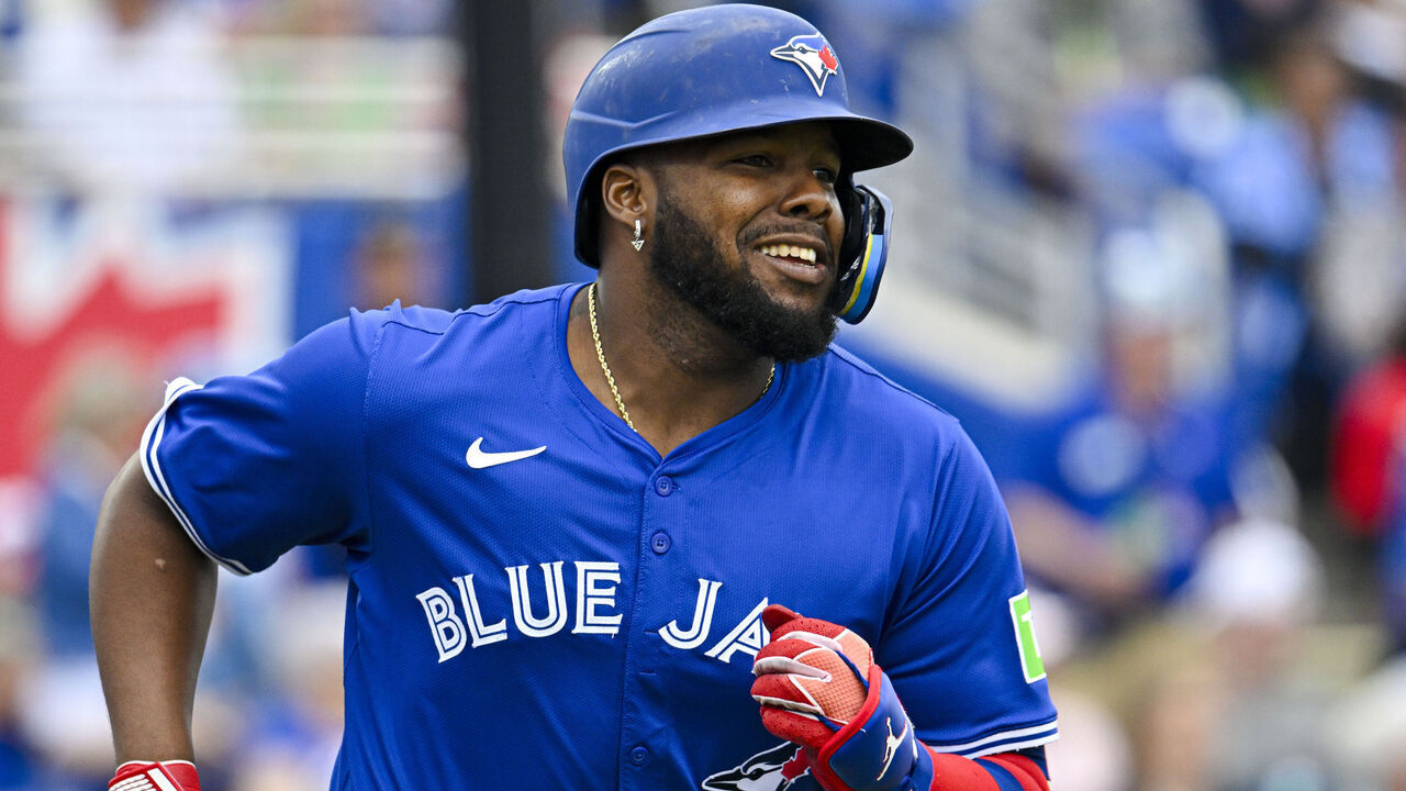 DUNEDIN, FLORIDA - MARCH 10: Vladimir Guerrero Jr #27 of the Toronto Blue Jays runs to first base against the Houston Astros during a Grapefruit League spring training game at TD Ballpark on March 10, 2025 in Dunedin, Florida.