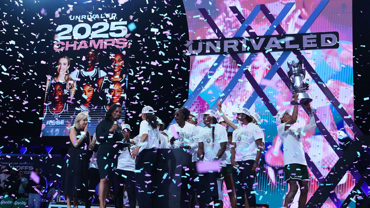 MEDLEY, FLORIDA - MARCH 17: Rose BC members lift the championship trophy after defeating Vinyl BC in the inaugural season of Unrivaled at Wayfair Arena on March 17, 2025 in Medley, Florida.
