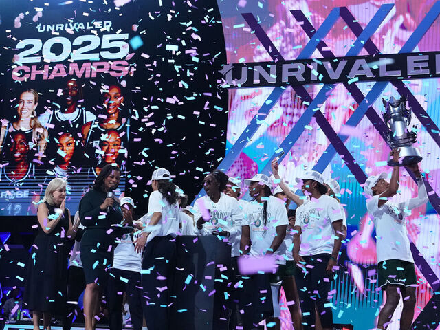 MEDLEY, FLORIDA - MARCH 17: Rose BC members lift the championship trophy after defeating Vinyl BC in the inaugural season of Unrivaled at Wayfair Arena on March 17, 2025 in Medley, Florida.