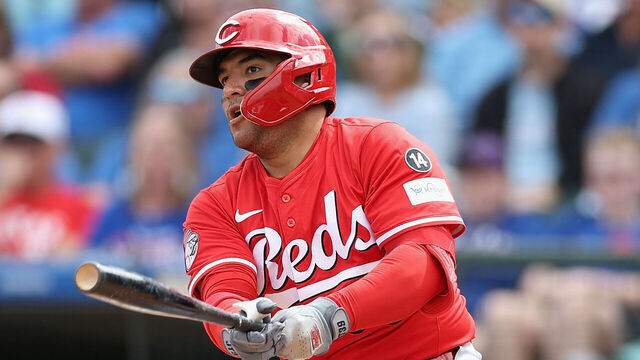 SURPRISE, ARIZONA - MARCH 12: Jose Trevino #35 of the Cincinnati Reds hits a double against the Texas Rangers during the second inning of the MLB game at Surprise Stadium on March 12, 2025 in Surprise, Arizona.