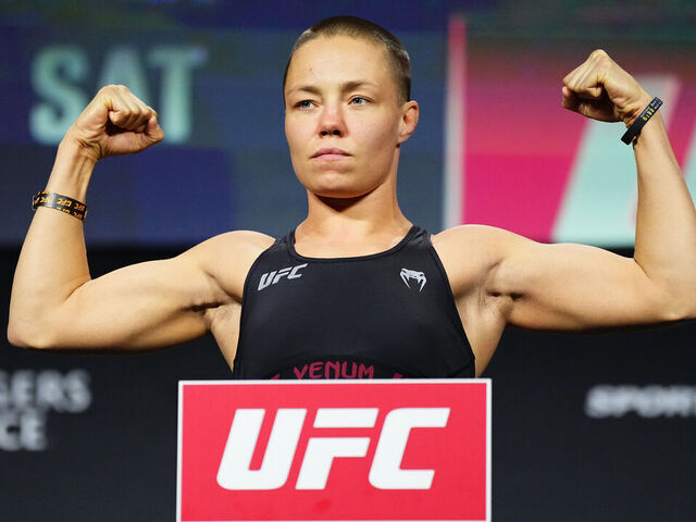 EDMONTON, ALBERTA - NOVEMBER 01: Rose Namajunas poses on the scale during the UFC Fight Night ceremonial weigh-in at Rogers Place on November 01, 2024 in Edmonton, Alberta.