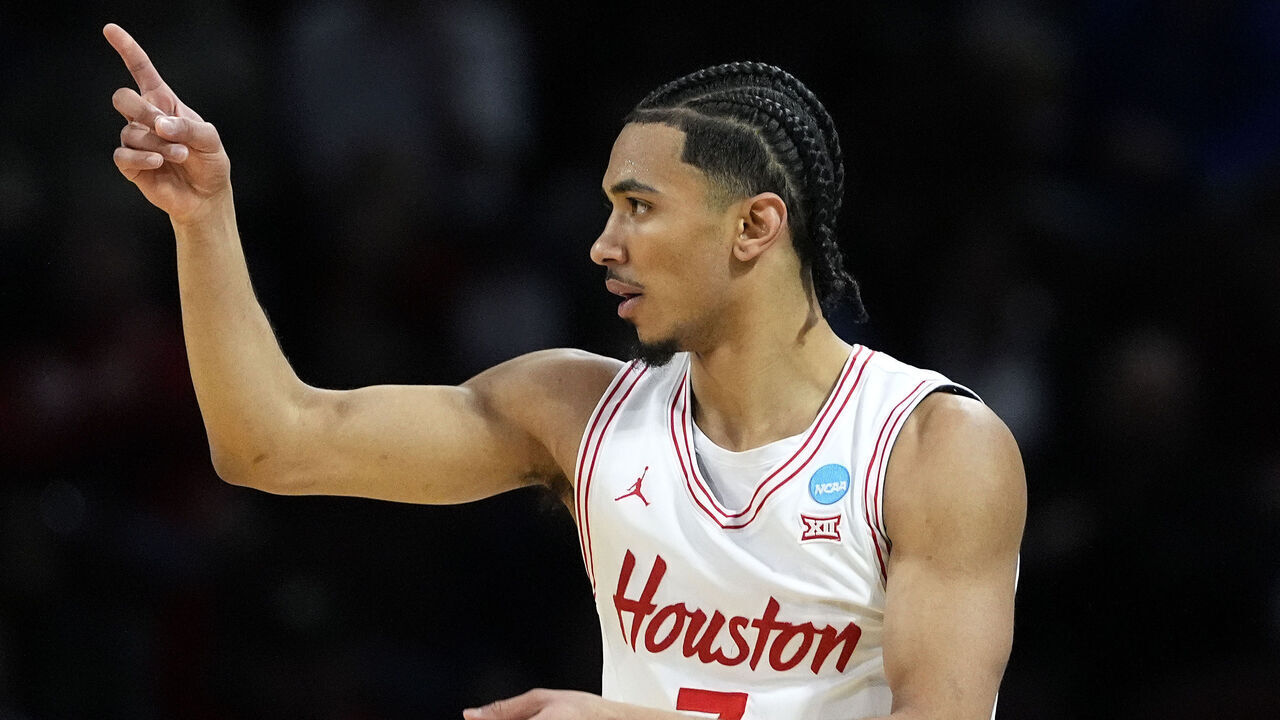 WICHITA, KANSAS - MARCH 20: Milos Uzan #7 of the Houston Cougars reacts after making a three-point basket against the SIU Edwardsville Cougars during the first half in the first round of the NCAA Men's Basketball Tournament at INTRUST Arena on March 20, 2025 in Wichita, Kansas.