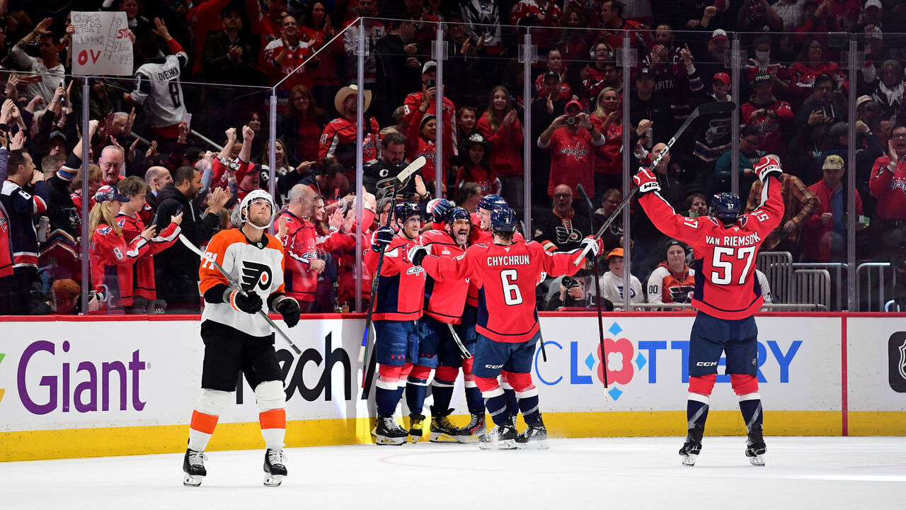 WASHINGTON, DC - MARCH 20: Capitals left wing Alexander Alex Ovechkin (8) celebrates with teammates after his 888th career NHL goal during the first period of the Philadelphia Flyers versus Washington Capitals National Hockey League game on March 20, 2025 at Capital One Arena in Washington, D.C..
