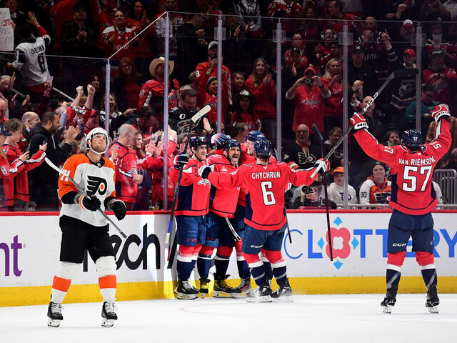 WASHINGTON, DC - MARCH 20: Capitals left wing Alexander Alex Ovechkin (8) celebrates with teammates after his 888th career NHL goal during the first period of the Philadelphia Flyers versus Washington Capitals National Hockey League game on March 20, 2025 at Capital One Arena in Washington, D.C..