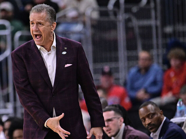 PROVIDENCE, RHODE ISLAND - MARCH 20: Head coach John Calipari of the Arkansas Razorbacks works the sideline during the first round of the 2025 NCAA Men's Basketball Tournament held at Amica Mutual Pavillion on March 20, 2025 in Providence, Rhode Island.