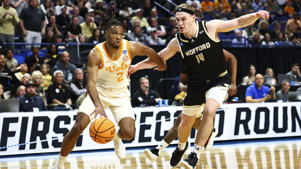 LEXINGTON, KENTUCKY - MARCH 20: Chaz Lanier #2 of the Tennessee Volunteers drives past Kyler Filewich #14 of the Wofford Terriers in the first half during the first round of the 2025 NCAA Men's Basketball Tournament held at Rupp Arena on March 20, 2025 in Lexington, Kentucky.