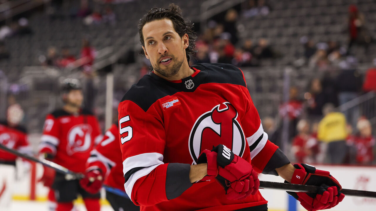 NEWARK, NJ - FEBRUARY 22: New Jersey Devils defenseman Brenden Dillon (5) warms up before a NHL game between the Dallas Stars and New Jersey Devils at Prudential Center on February 22, 2025 in Newark, New Jersey.