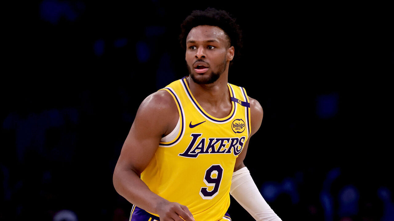 LOS ANGELES, CALIFORNIA - MARCH 20: Bronny James #9 of the Los Angeles Lakers brings the ball up court during the fourth quarter against the Milwaukee Bucks at Crypto.com Arena on March 20, 2025 in Los Angeles, California.