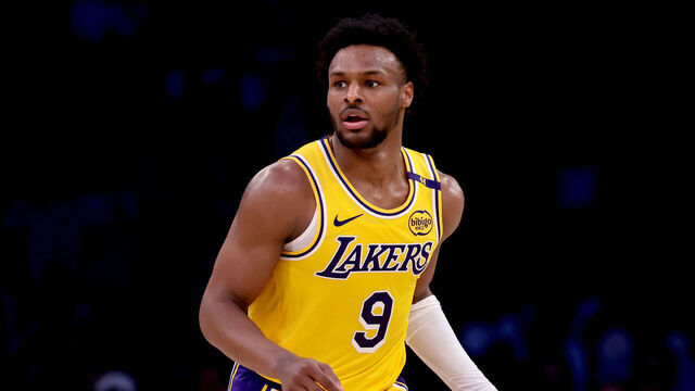 LOS ANGELES, CALIFORNIA - MARCH 20: Bronny James #9 of the Los Angeles Lakers brings the ball up court during the fourth quarter against the Milwaukee Bucks at Crypto.com Arena on March 20, 2025 in Los Angeles, California.