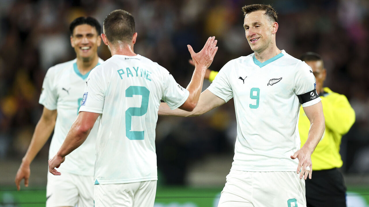 WELLINGTON, NEW ZEALAND - MARCH 21: Tim Payne of New Zealand celebrates with Chris Wood after scoring a goal during the FIFA World Cup 2026 OFC Qualifier Semi Final match between New Zealand All Whites and Fiji at Sky Stadium on March 21, 2025 in Wellington, New Zealand.