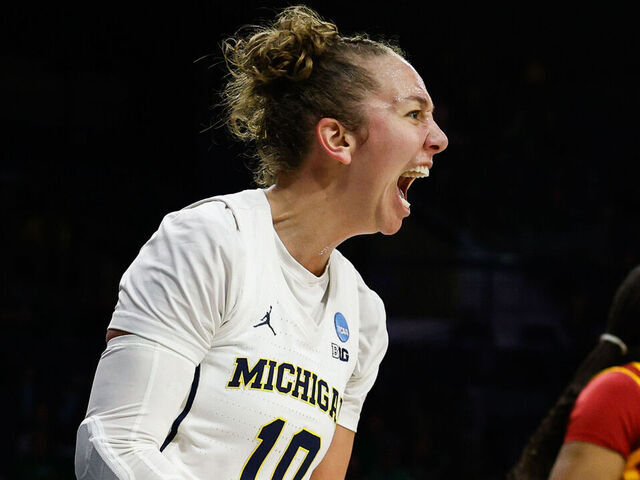 SOUTH BEND, IN - MARCH 21: Jordan Hobbs #10 of Michigan celebrates a lay up during a game between Iowa State and Michigan at Purcell Pavilion at The Joyce Center on March 21, 2025 in South Bend, Indiana.