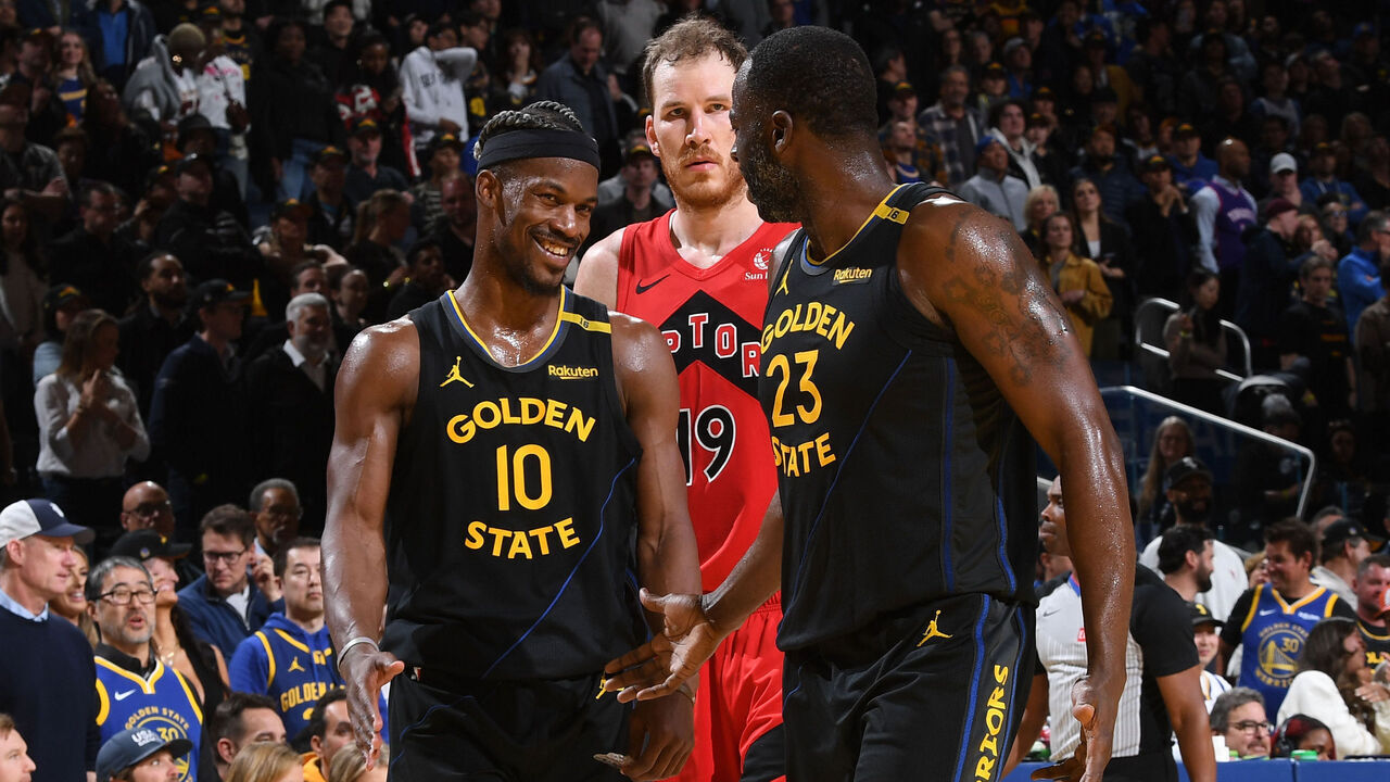 SAN FRANCISCO, CA - MARCH 20: Draymond Green #23 and Jimmy Butler #10 of the Golden State Warriors celebrate during the game against the Toronto Raptors on March 20, 2025 at Chase Center in San Francisco, California. NOTE TO USER: User expressly acknowledges and agrees that, by downloading and or using this photograph, user is consenting to the terms and conditions of Getty Images License Agreement. Mandatory Copyright Notice: Copyright 2025 NBAE