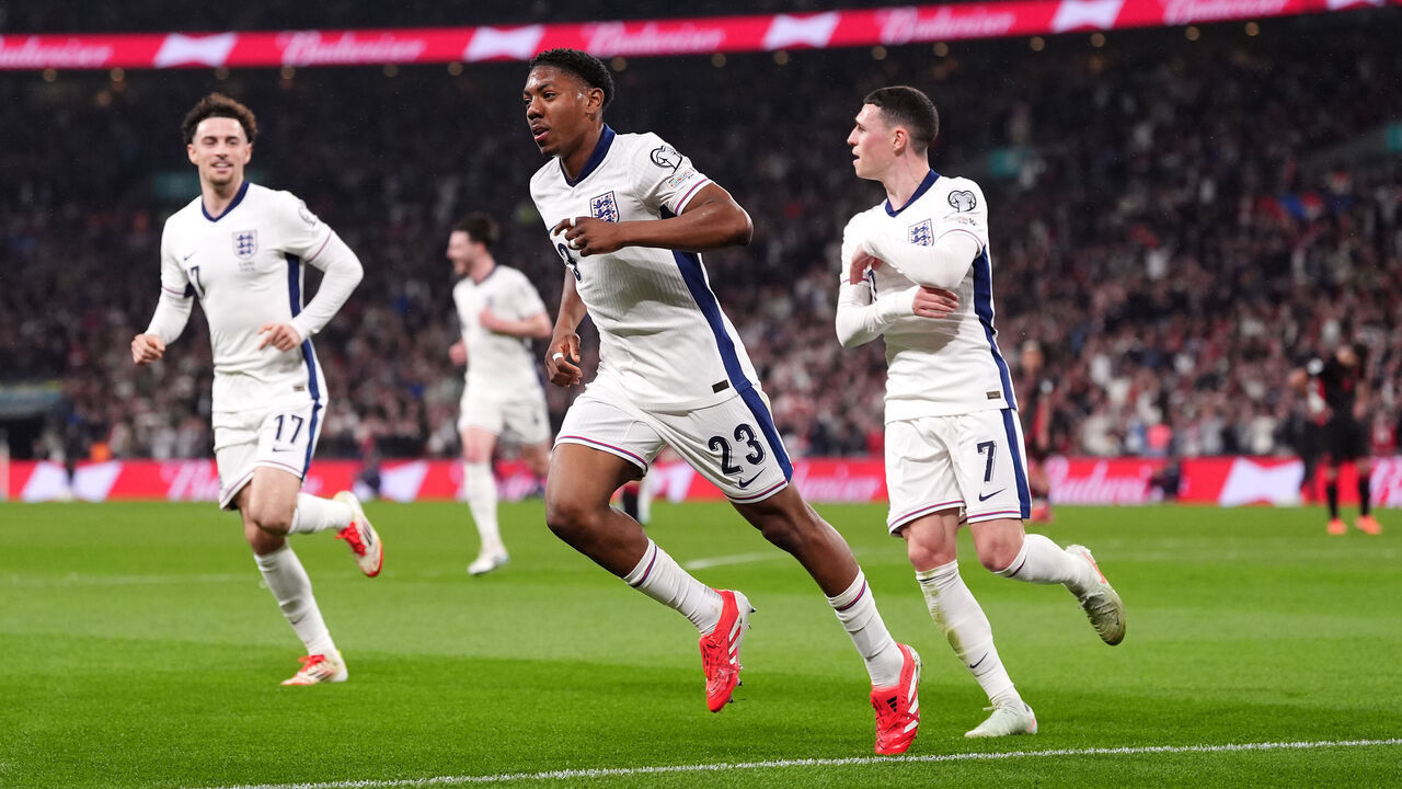 England's Myles Lewis-Skelly celebrates scoring their side's first goal of the game during the 2026 FIFA World Cup Qualifying, Group K match at Wembley Stadium, London. Picture date: Friday March 21, 2025.
