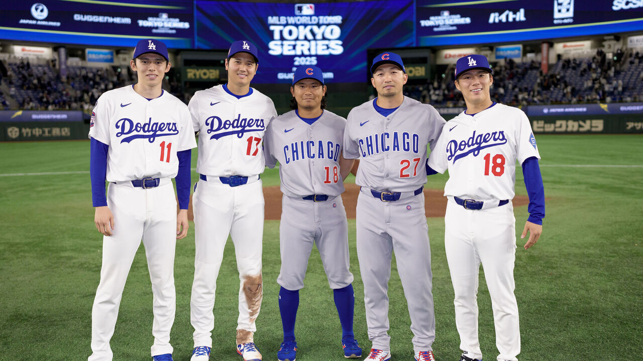 TOKYO, JAPAN - MARCH 19: Roki Sasaki #11, Shohei Ohtani #17 and Yoshinobu Yamamoto #18 of the Los Angeles Dodgers, and Shota Imanaga #18 and Seiya Suzuki #27 of the Chicago Cubs pose for a photo at the conclusion of the MLB Tokyo Opening Series at Tokyo Dome on March 19, 2025 in Tokyo, Japan.
