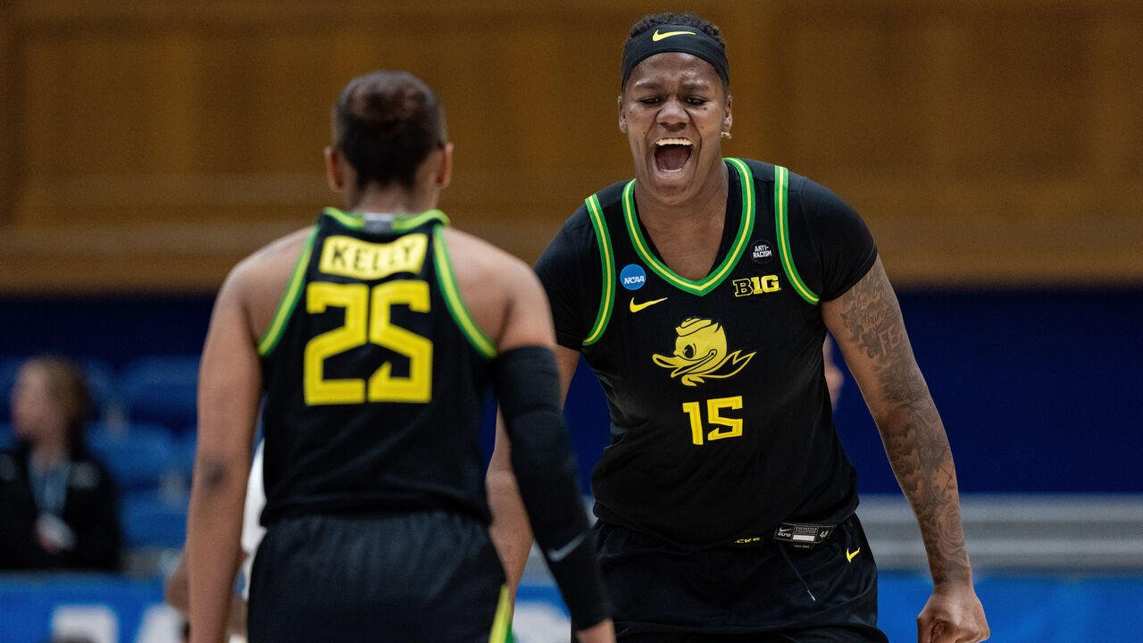 DURHAM, NORTH CAROLINA - MARCH 21: Phillipina Kyei #15 of the Oregon Ducks celebrates with Deja Kelly #25 in the second half against the Vanderbilt Commodores during a first round game of the women’s NCAA basketball tournament at Cameron Indoor Stadium on March 21, 2025 in Durham, North Carolina.