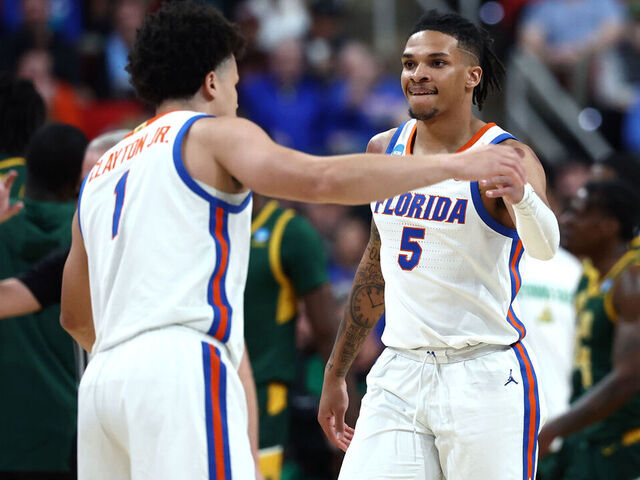 RALEIGH, NORTH CAROLINA - MARCH 21: Walter Clayton Jr. #1 and Will Richard #5 of the Florida Gators celebrate during the first half in the first round of the NCAA Men's Basketball Tournament against the Norfolk State Spartans at Lenovo Center on March 21, 2025 in Raleigh, North Carolina.