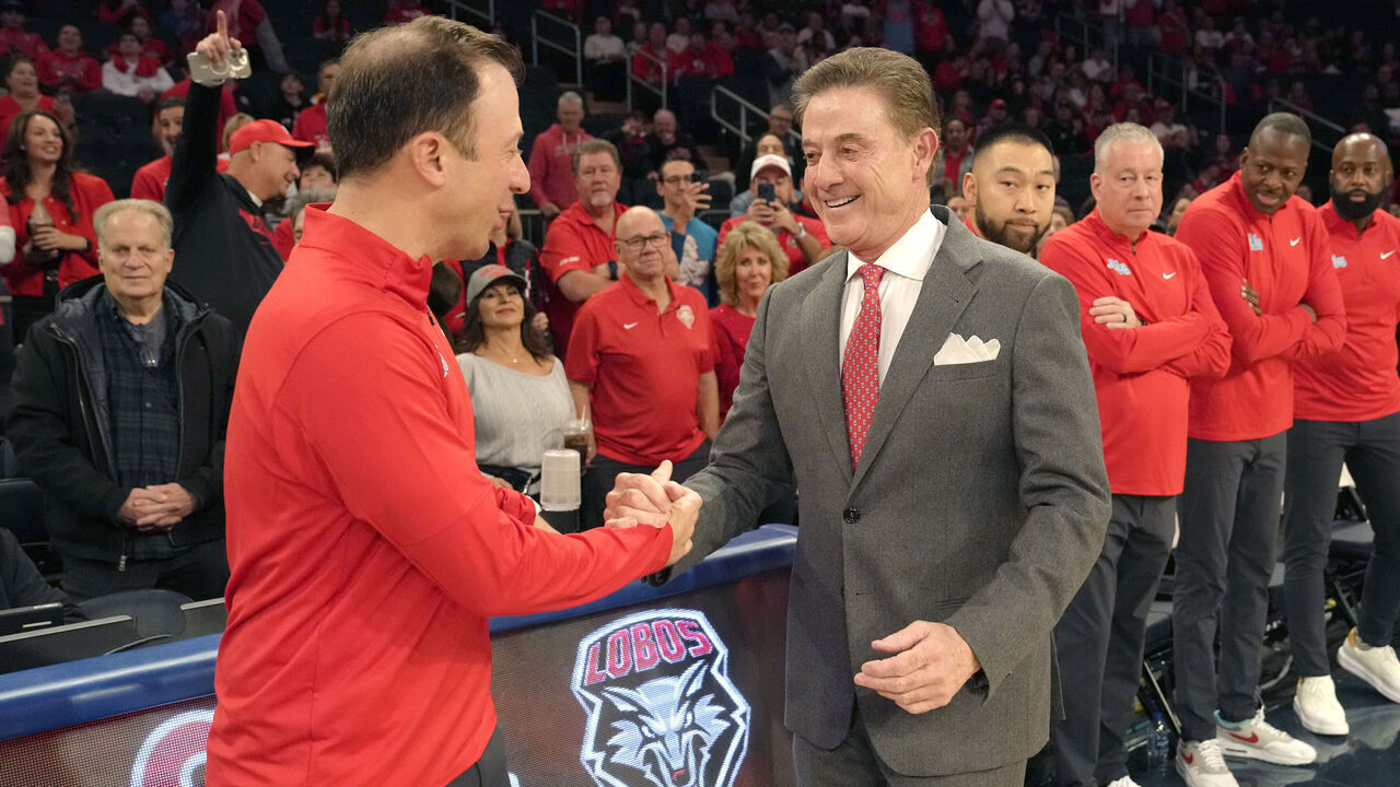 NEW YORK, NY - NOVEMBER 12: Father and son Head coach Richard Pitino of the New Mexico Lobos and Rick Pitino of the St. Johns Red Storm before a college basketball game at Madison Square Garden on November 12, 2024 in New York, New York.