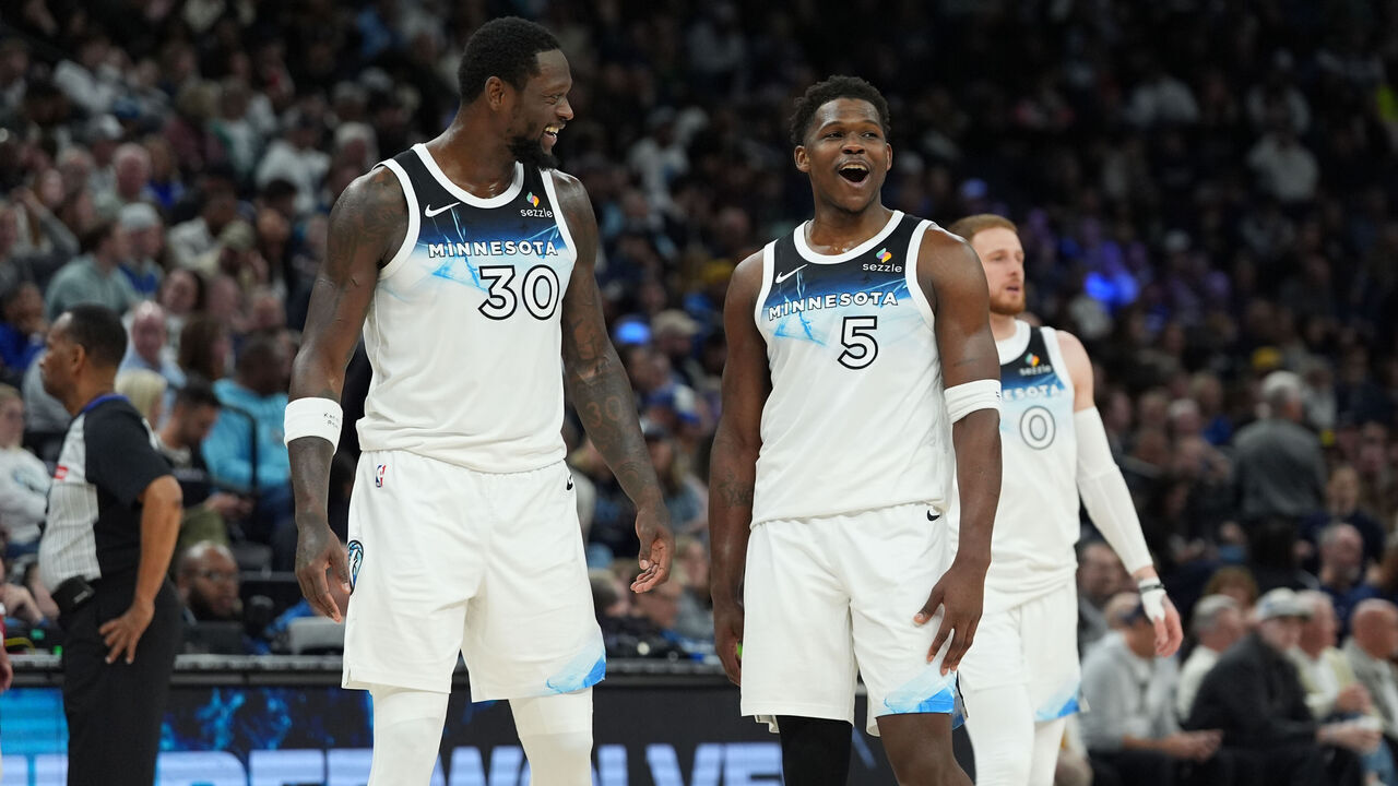 MINNEAPOLIS, MN - MARCH 21: Julius Randle #30 and Anthony Edwards #5 of the Minnesota Timberwolves smile during the game against the New Orleans Pelicans on March 21, 2025 at Target Center in Minneapolis, Minnesota. Mandatory Copyright Notice: Copyright 2025 NBAE