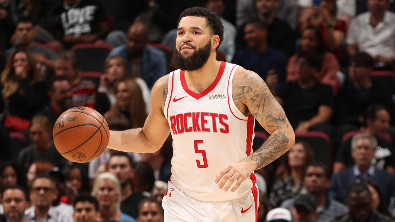 MIAMI, FL - MARCH 21: Fred VanVleet #5 of the Houston Rockets dribbles the ball during the game against the Miami Heat on March 21, 2025 at Kaseya Center in Miami, Florida. Mandatory Copyright Notice: Copyright 2025 NBAE