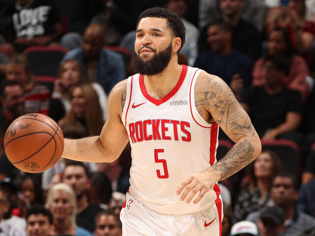 MIAMI, FL - MARCH 21: Fred VanVleet #5 of the Houston Rockets dribbles the ball during the game against the Miami Heat on March 21, 2025 at Kaseya Center in Miami, Florida. Mandatory Copyright Notice: Copyright 2025 NBAE