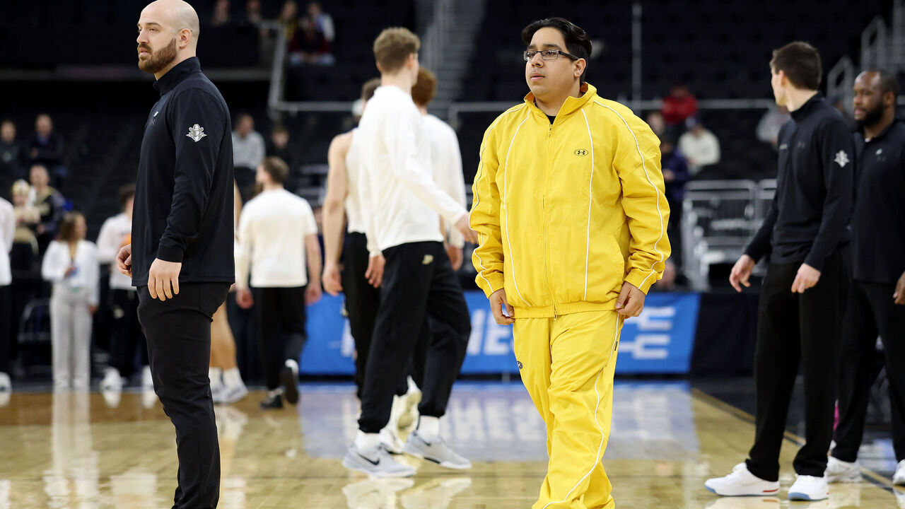 PROVIDENCE, RHODE ISLAND - MARCH 22: McNeese State student manager Amir "Aura" Khan walks the court prior to the game against the Purdue Boilermakers in the second round of the NCAA Men's Basketball Tournament at Amica Mutual Pavillion on March 22, 2025 in Providence, Rhode Island.