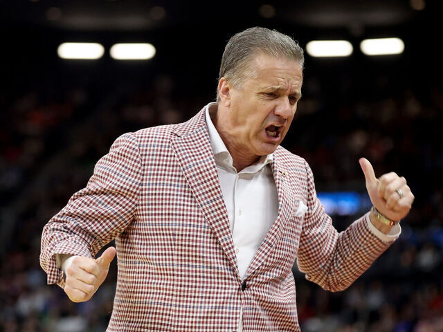 PROVIDENCE, RHODE ISLAND - MARCH 22: Head coach John Calipari of the Arkansas Razorbacks reacts against the St. John's Red Storm during the first half in the second round of the NCAA Men's Basketball Tournament at Amica Mutual Pavillion on March 22, 2025 in Providence, Rhode Island.