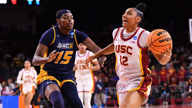 LOS ANGELES, CA - MARCH 22: USC Trojans guard JuJu Watkins (12) drives to the basket during the UNC Greensboro Spartans game versus the USC Trojans in the first round of the NCAA Division I Women's Championship on March 22, 2025, at the Galen Center in Los Angeles, CA.