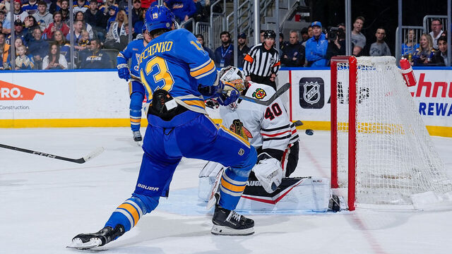 ST. LOUIS, MO - MARCH 22: Alexey Toropchenko #13 of the St. Louis Blues scores a goal against the Chicago Blackhawks on March 22, 2025 at the Enterprise Center in St. Louis, Missouri.