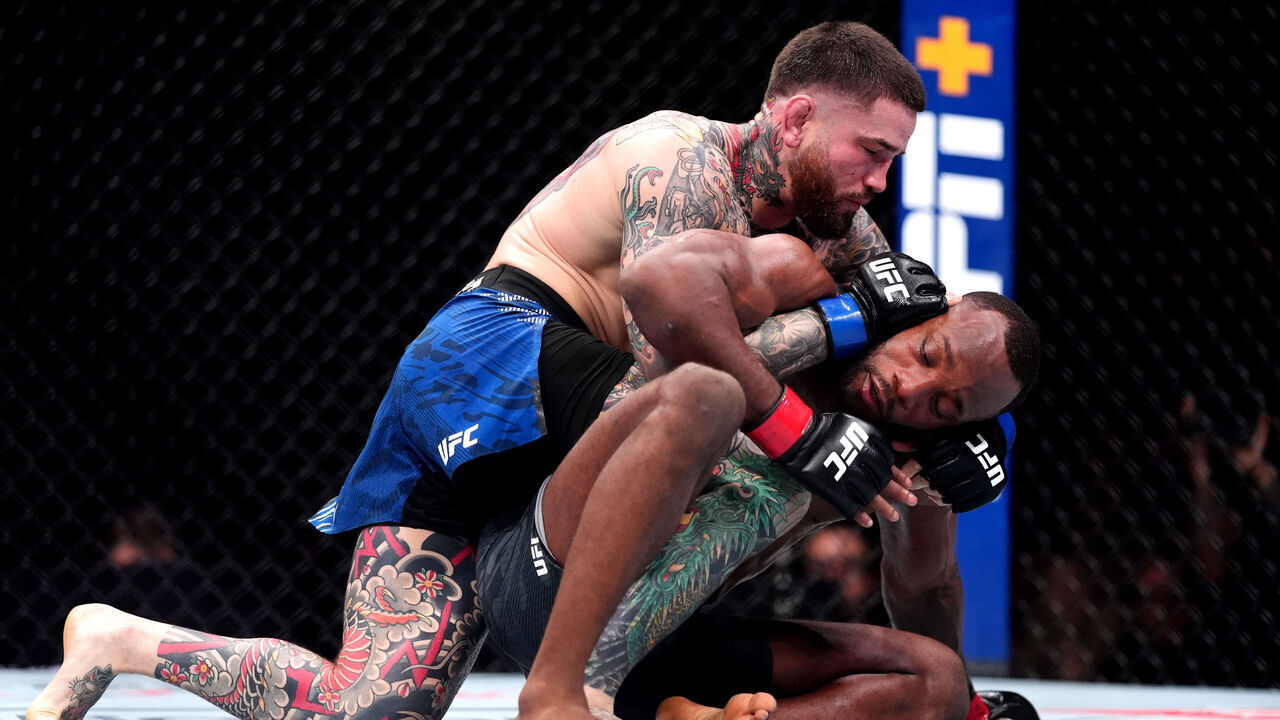 Sean Brady (left) in action against Leon Edwards during the welterweight bout during UFC Fight Night at The O2, London. Picture date: Saturday March 22, 2025.