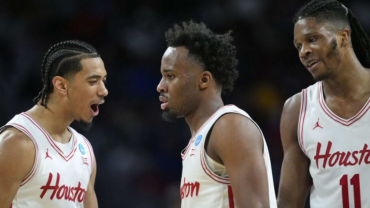 WICHITA, KANSAS - MARCH 22: Milos Uzan #7, L.J. Cryer #4, and Joseph Tugler #11 of the Houston Cougars react during the first half against the Gonzaga Bulldogs in the second round of the NCAA Men's Basketball Tournament at INTRUST Arena on March 22, 2025 in Wichita, Kansas.