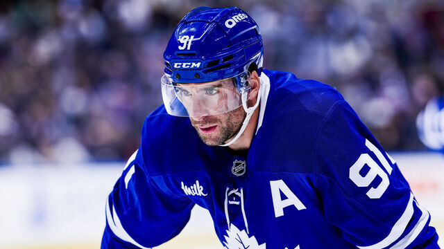 TORONTO, ON - MARCH 19: John Tavares #91 of the Toronto Maple Leafs looks on during the first period against the Colorado Avalanche at the Scotiabank Arena on March 19, 2025 in Toronto, Ontario, Canada.