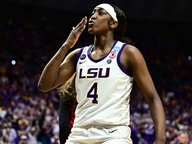 BATON ROUGE, LOUISIANA - MARCH 22: Flau'Jae Johnson #4 of the LSU Tigers celebrates against the San Diego State Aztecs during the First Round of the 2025 NCAA Women's Basketball Tournament held at Pete Maravich Assembly Center on March 22, 2025 in Baton Rouge, Louisiana.