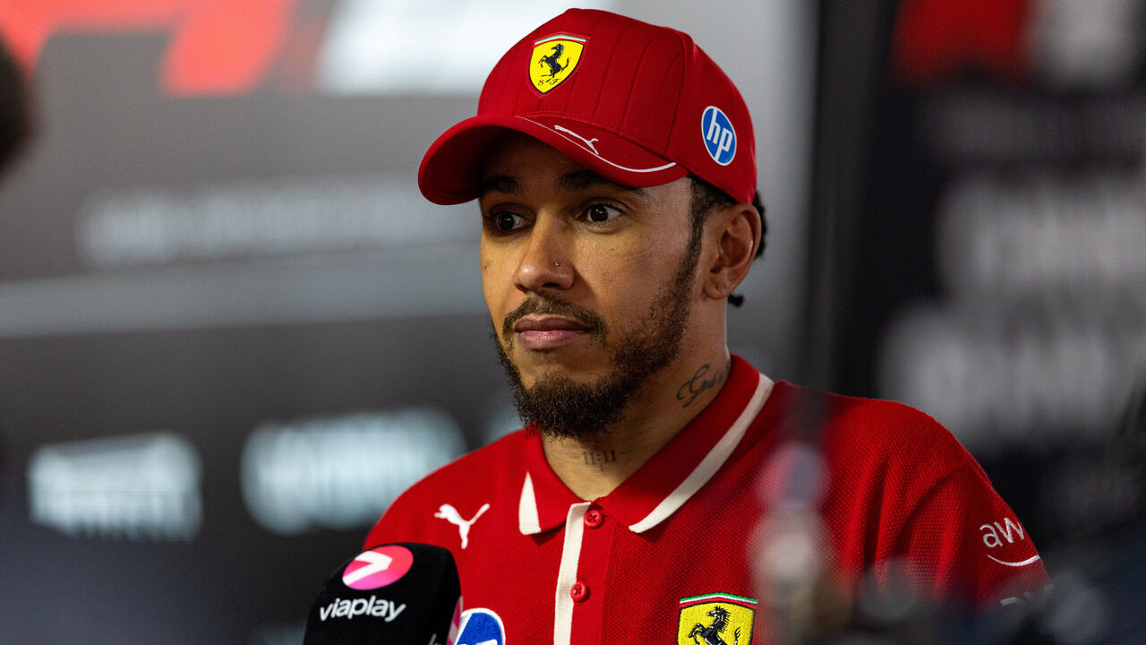 SHANGHAI, CHINA - MARCH 23: Lewis Hamilton of Great Britain and Ferrari speaks in the media pen during the F1 Grand Prix of China at Shanghai International Circuit on March 23, 2025 in Shanghai, China.