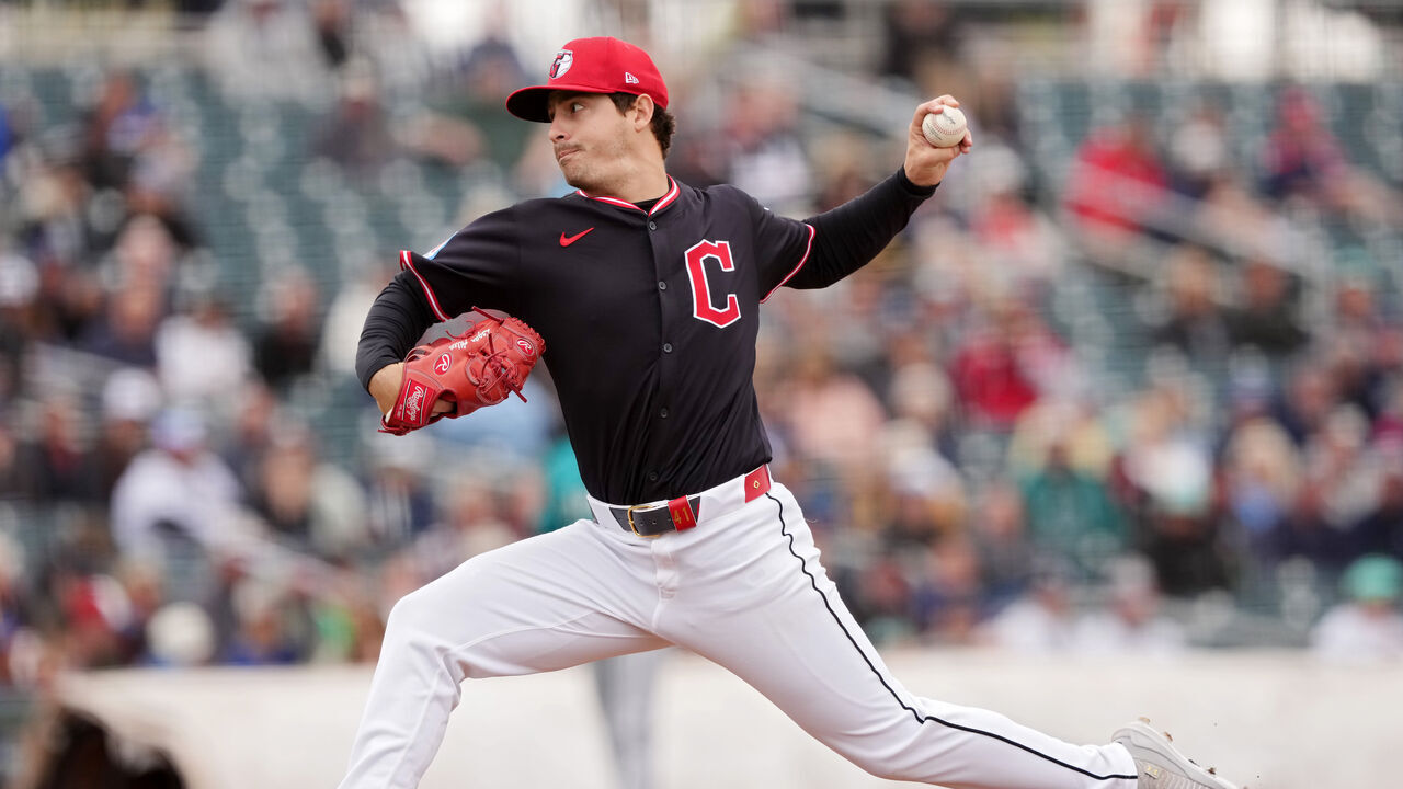 GOODYEAR, ARIZONA - MARCH 14: Logan Allen #26 of the Cleveland Guardians pitches in the first inning against the Seattle Mariners during a spring training game at Goodyear Ballpark on March 14, 2025 in Goodyear, Arizona.