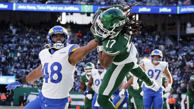 EAST RUTHERFORD, NEW JERSEY - DECEMBER 22: (NEW YORK DAILIES OUT) Davante Adams #17 of the New York Jets in action against Omar Speights #48 of the Los Angeles Rams at MetLife Stadium on December 22, 2024 in East Rutherford, New Jersey. The Rams defeated the Jets 19-9.
